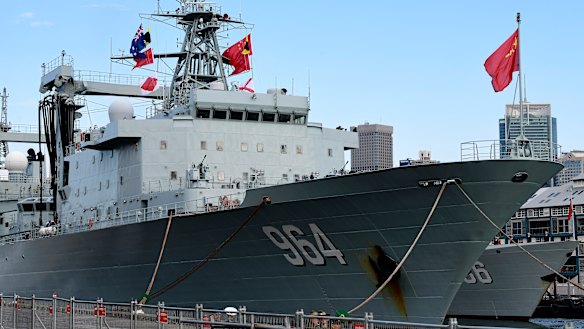 The Australian and Chinese flags are seen on board a Chinese warship after it arrived at Garden Island Naval Base in Sydney on Monday.