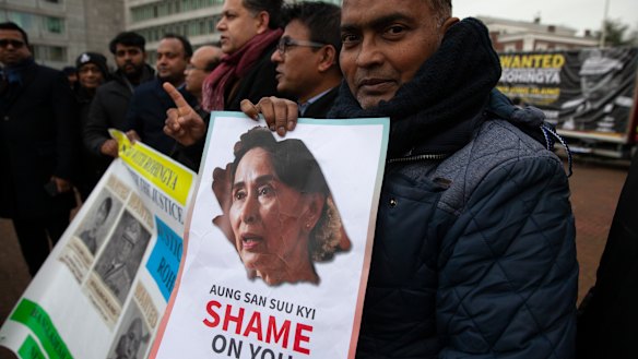 Demonstrators gather outside the International Court of Justice in The Hague on Tuesday.