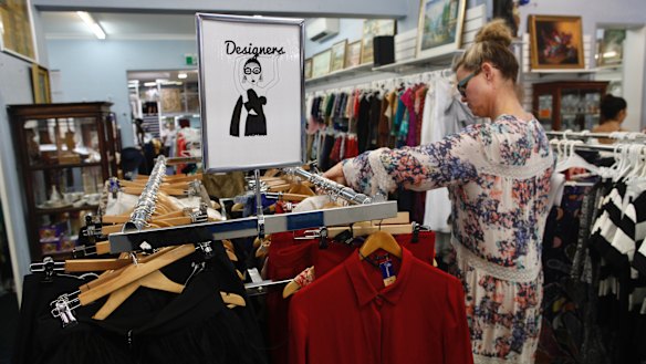 Bargain hunters search the racks inside the Vinnies store  in Waverley.