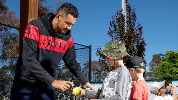 Kyrgios signing autographs at the recent Canberra International.