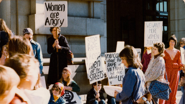 Women protest in the street in a scene from the documentary Brazen Hussies. 