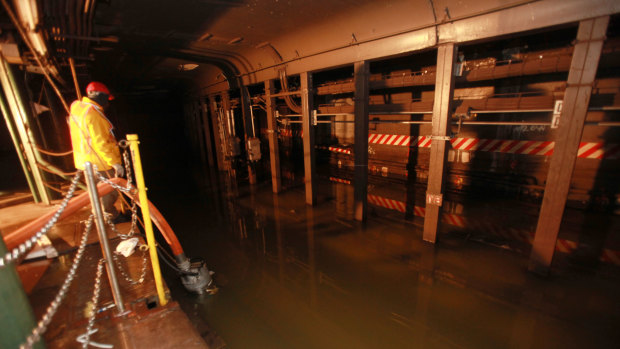 A growing problem for subway stations. Floodwaters from Hurricane Sandy below Grand Central Station in New York in 2012. 