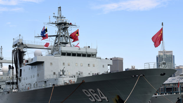 The Australian and Chinese flags are seen on board a Chinese warship after it arrived at Garden Island Naval Base in Sydney last month