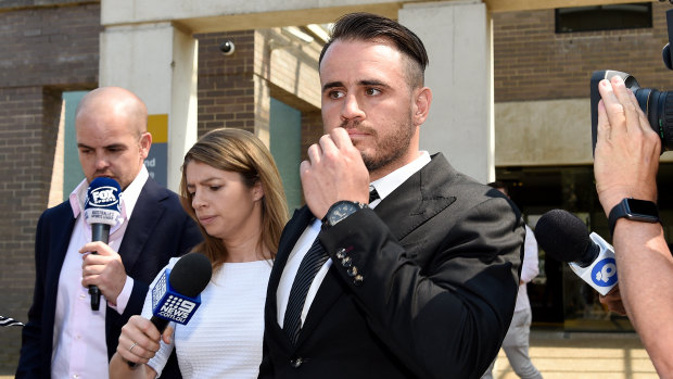 Josh Reynolds leaves court in December. The charges have now been dropped.