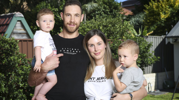 Shane Mumford at home with his wife Eva and their children Theo (left) and Ollie.