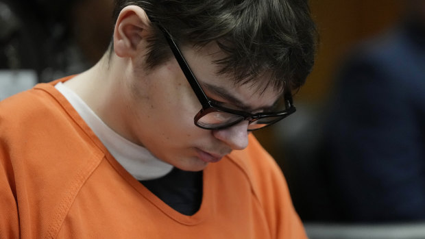 Ethan Crombley sits in court during his trial.
