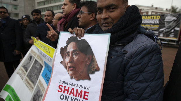 Demonstrators gather outside the International Court of Justice in The Hague on Tuesday.