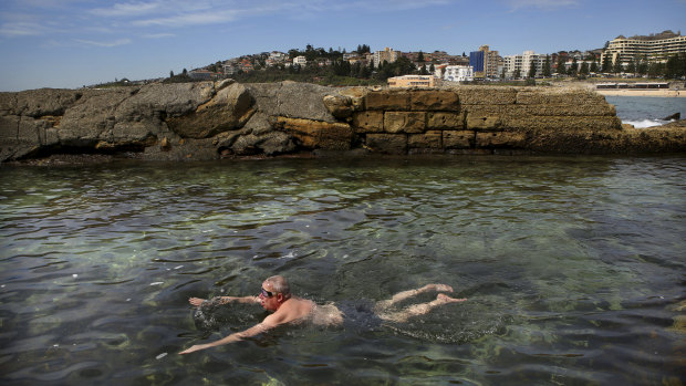 Swimmers cool off on the city's hottest day so far this summer. 