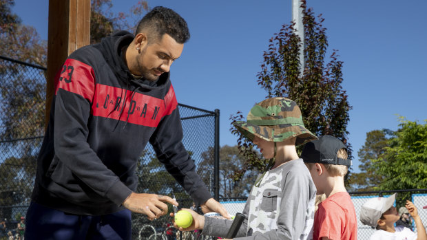 Kyrgios signing autographs at the recent Canberra International.