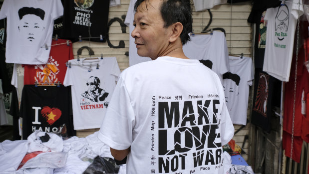Hanoi T-shirt maker Duc Truong Thanh models his favourite Donald Trump and Kim Jong-un creation.