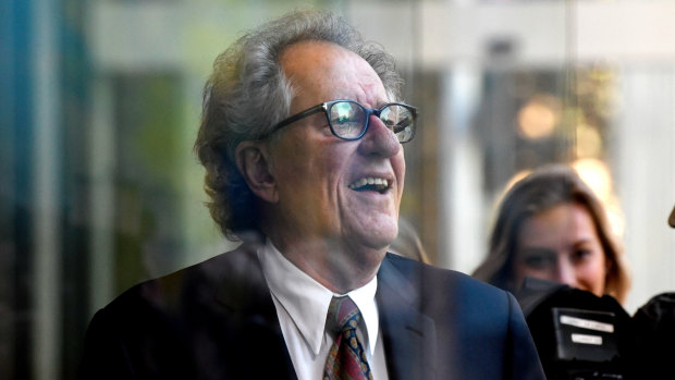 Geoffrey Rush leaves court on Monday afternoon.