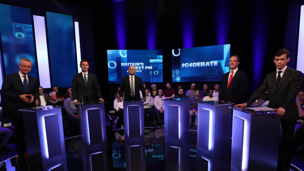Left to right: Michael Gove, Jeremy Hunt, Sajid Javid, Dominic Raab and Rory Stewart, with an empty plinth representing absent candidate Boris Johnson, ahead of the live television debate on Channel 4.