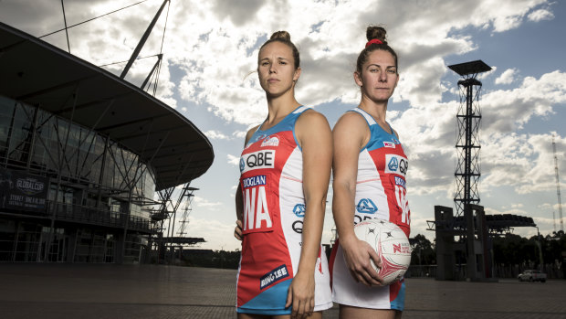 Braced: Swifts' Paige Hadley (left) Abbey McCulloch are ready for a physical encounter this weekend.