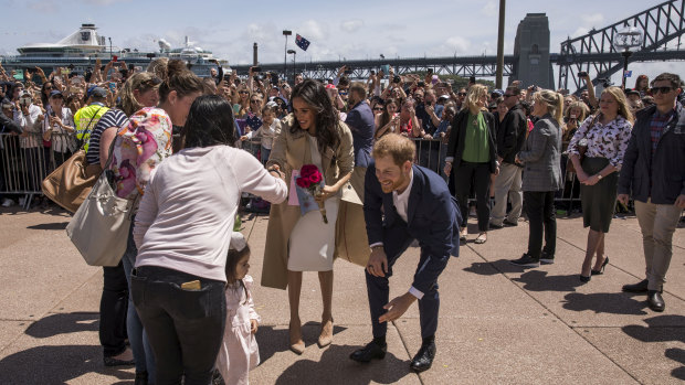 The Duke and Duchess, Harry and Meghan meet the crowd outside the Sydney Opera House.