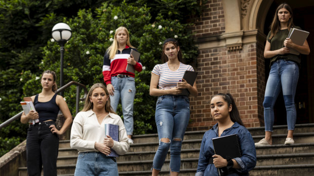 Students (left to right) Lily Mauger, Heidi Crookes, Paulina Elvshenkova, Emily Storey, Caitlyn Russo and Anja Larson, are residents of the Women’s College at the University of Sydney. Many of their college mates have returned home due to the coronavirus outbreak but they would prefer to stay and are worried the government might close the college.