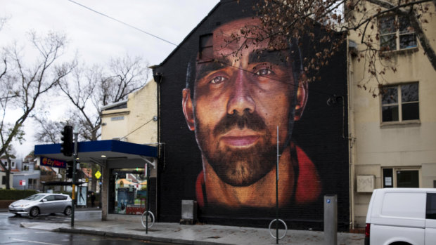The  mural of former AFL Sydney Swans player Adam Goodes painted by Apparition Media on the corner Foveaux and Crown street in Surry Hills this week.
