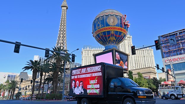 Ahead of the midterm elections, a mobile billboard travels down the Las Vegas Strip on Friday.