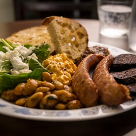 Breakfast plate with kransky, black pudding, Nordic egg spread and more.