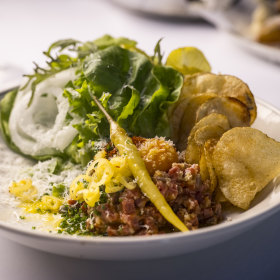 Beef tartare with feferoni and semolina yolk.
