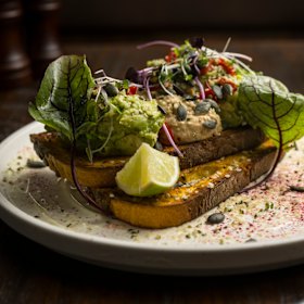 Smashed avocado and sweet potato hummus on toast.