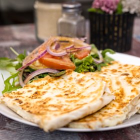 The cheese and mozzarella gozleme with a side of salad at Coburg’s Chorba Cafe.