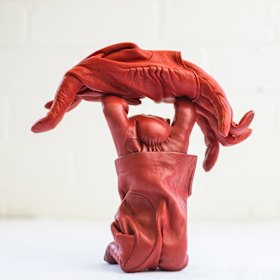 Gartside creates rabbits from leather gloves.