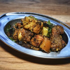 Peppery dry pork curry.