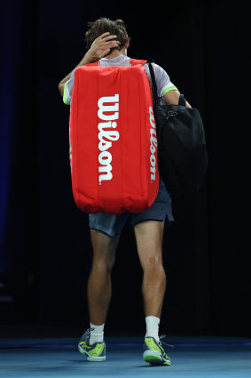 Alex de Minaur leaves Rod Laver Arena for the final time in the 2023 Australian Open.