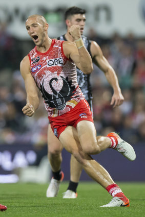 Six of the best: Sam Reid on his way to a bag against the Pies.