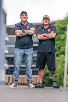 Veteran Tim Cuming and Tony Dorney (right) who lost his leg in a parachuting accident, at the veteran-run coffee shop, counselling and rehabilitation centre in Bowen Hills, Brisbane.