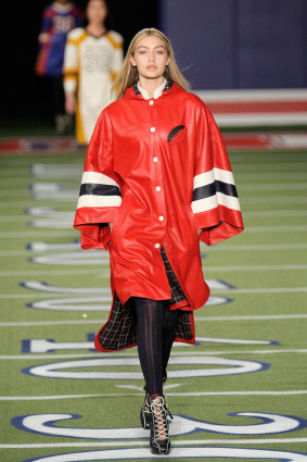 Poncho panache ... Gigi Hadid in her first runway appearance for Tommy Hilfiger.