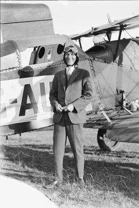 “Royal Australian Air Force pilot Mr Terry standing next to his plane, New South Wales, 4 June 1927.”