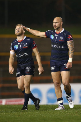 Andrew Deegan of the Rebels and Bill Meakes of the Rebels celebrate victory during the round 6 Super Rugby AU match between the Rebels and Brumbies at Leichhardt Oval on August 07, 2020 in Sydney, Australia.