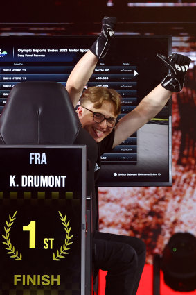 Kylian Drumont of Team France celebrates after winning the Gran Turismo motor sport finals on day four of the Olympic Esports Week