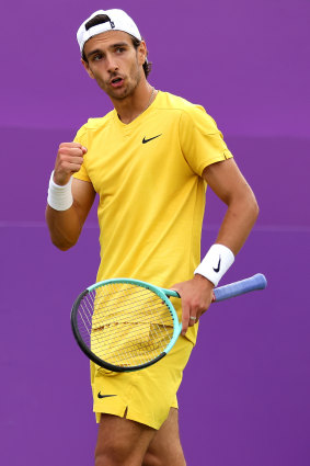 Italy’s Lorenzo Musetti celebrates in his win over de Minaur.