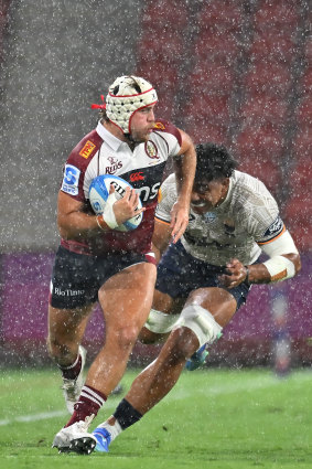 Fraser McReight makes a break against Moana Pasifika.