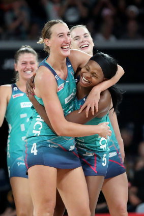 Vixens Emily Mannix and Mwai Kumwenda celebrate their last-gasp win.