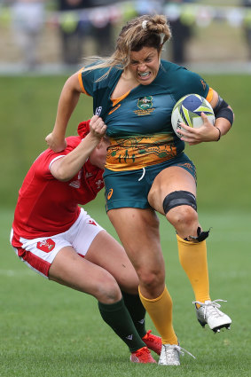 Grace Hamilton charges through the Welsh defence at the World Cup.