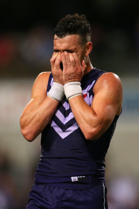 Ryan Crowley of the Dockers looks on dejected after losing the semi final.