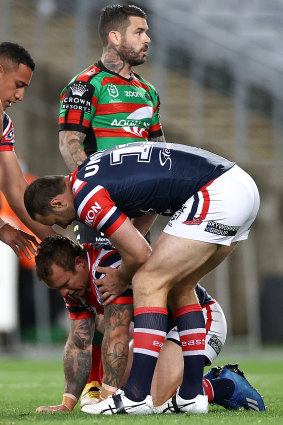 Roosters hooker Jake Friend goes down injured on Friday night.