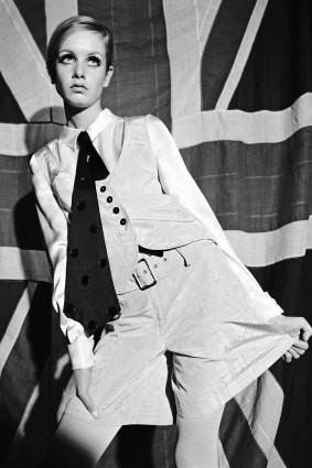 Twiggy models a Mary Quant waistcoat and shirt ensemble in 1966.
