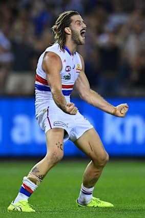 Josh Bruce celebrates reaching his double-figure tally.