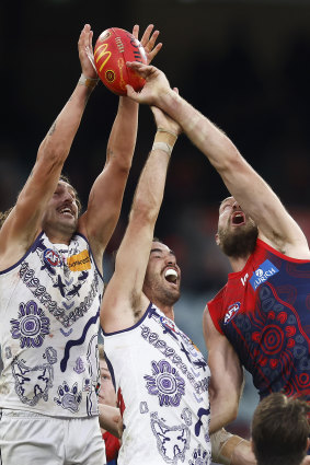 Luke Jackson of the Dockers, left, and Max Gawn of the Demons contest the ball. 