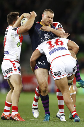 Cheyse Blair is mobbed by Dragons at AAMI Park. Photo: AAP