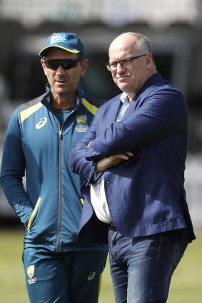Justin Langer with Cricket Australia chairman Earl Eddings (right).