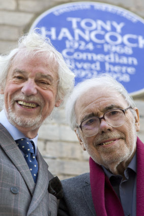 Ray Galton (left) and Alan Simpson in front of an English Heritage blue plaque, 2014.