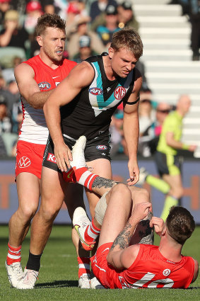 Tempers flare between Ollie Wines and Peter Ladhams.