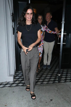 Courtney Cox's tailored pants and oversized specs are hallmarks of grandpa dressing.