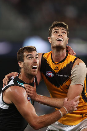 Eyes on the ball: Scott Lycett, left, and Ned Reeves in action during round two. 