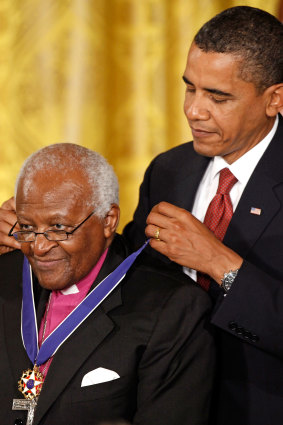 President Barack Obama presents the Medal of Freedom to Bishop Desmond Tutu during a ceremony in the East Room of the White House in 2009.